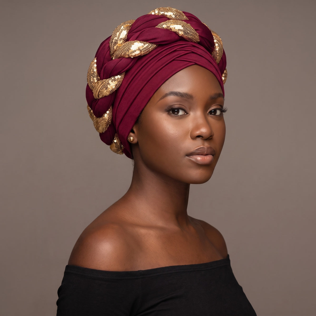 Woman wearing the red wine sequin braided turban