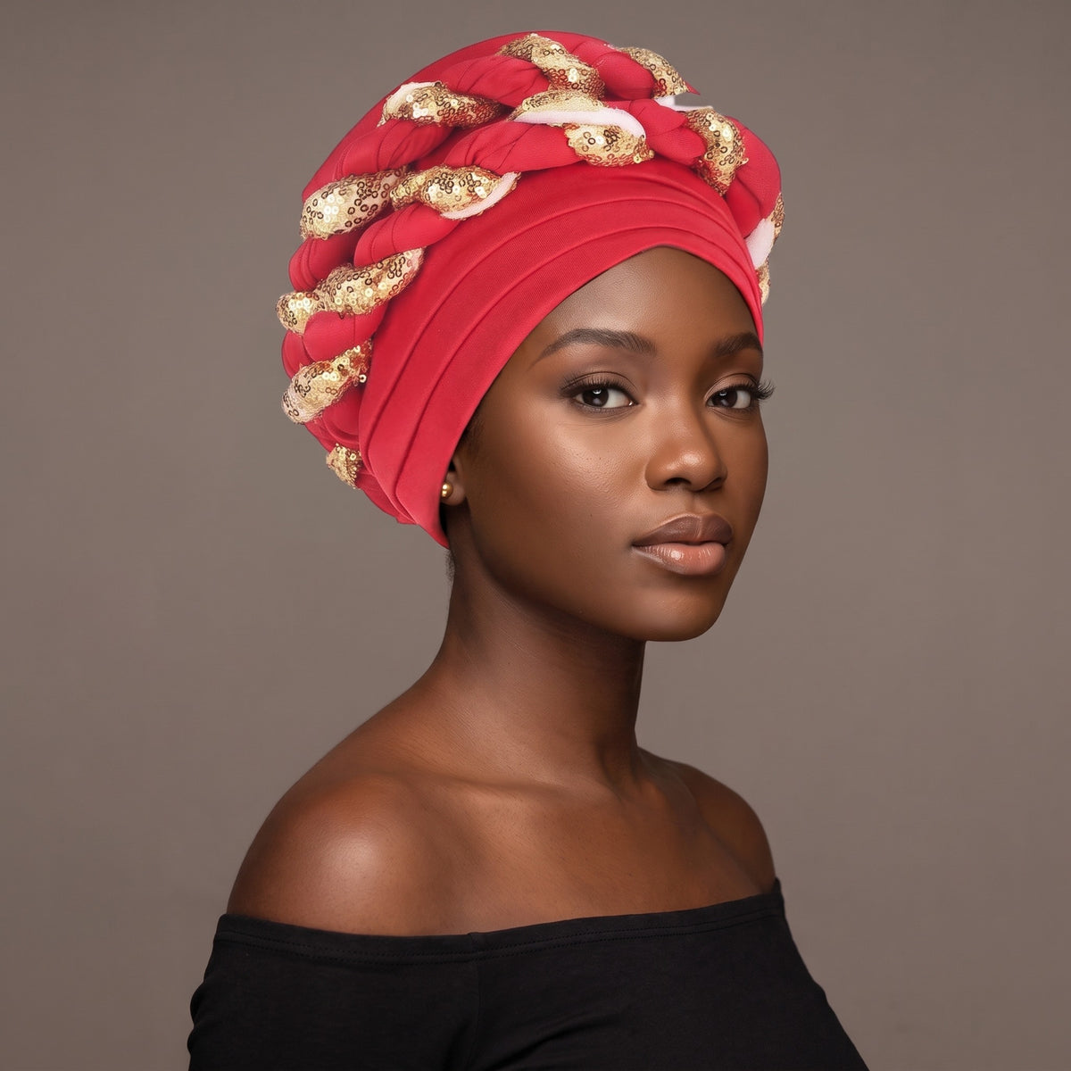 Woman wearing the red sequin braided turban