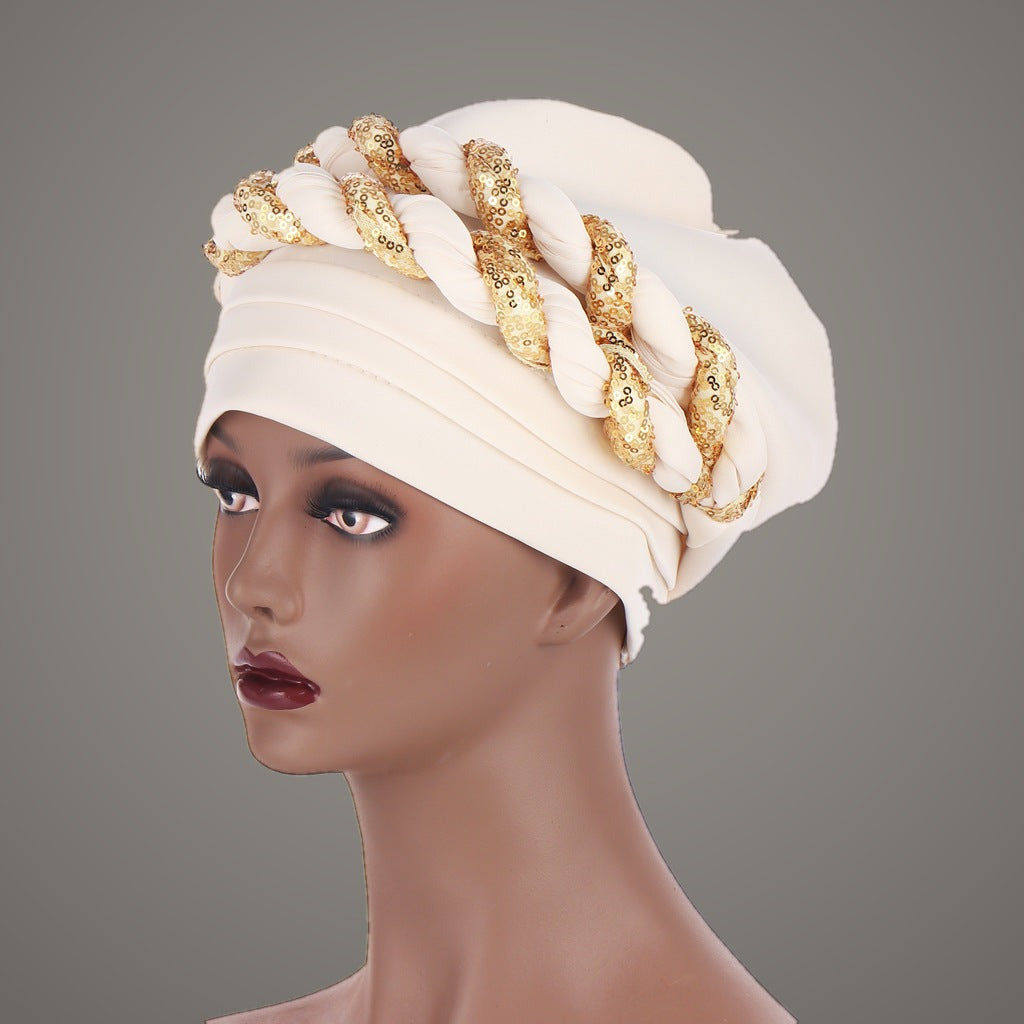 Beige sequin braided turban with gold sequin twists