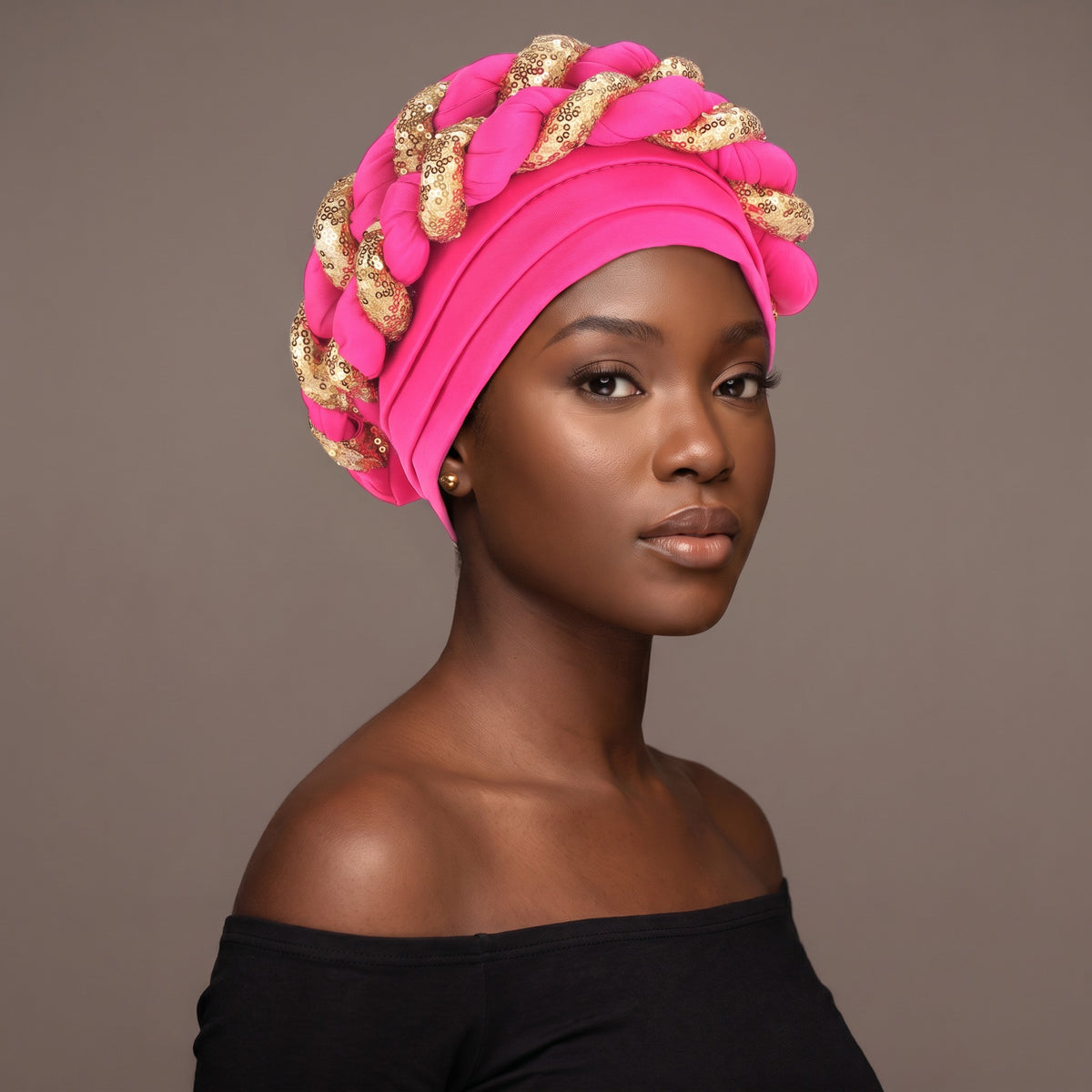 Woman wearing the rose red sequin braided turban