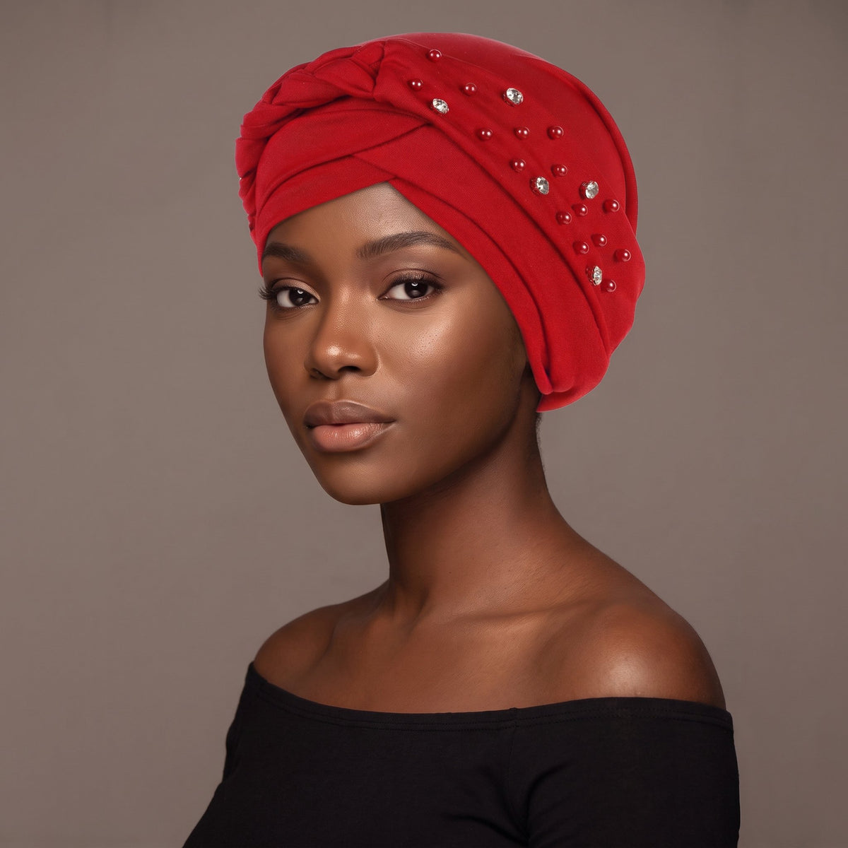 Woman wearing the pearl red three-layer twist turban