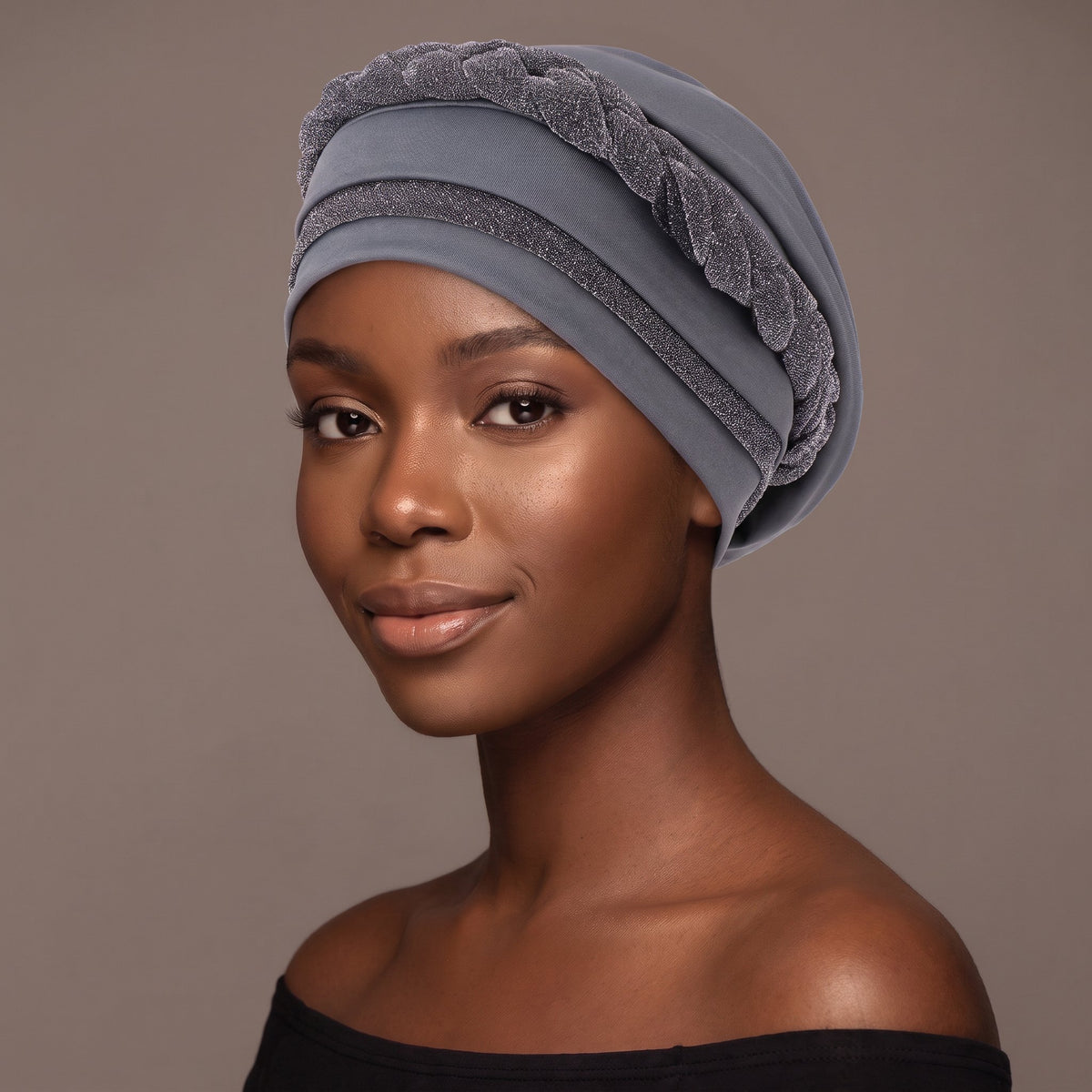 Woman wearing the mesh grey three-layer twist turban