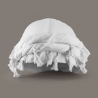 White cotton halo turban with tassel trim on a grey backdrop